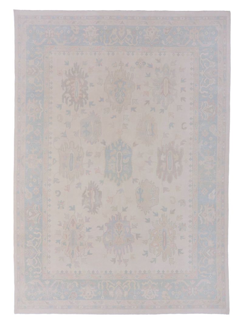 Beige area rug with subtle pattern on a plain background