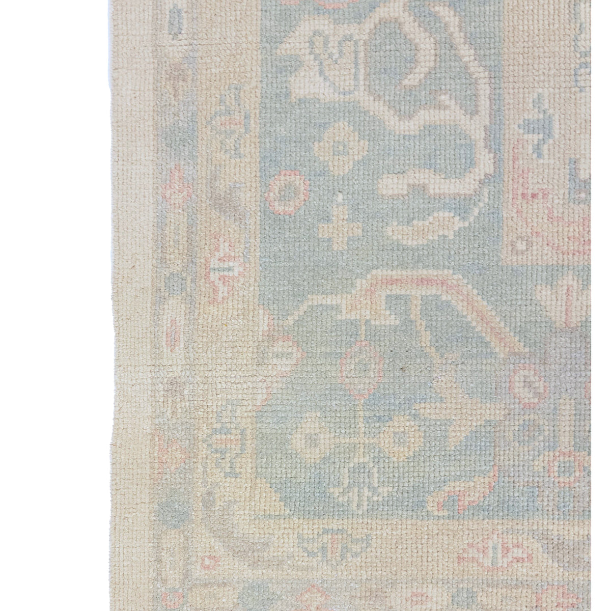 Decorative rug with intricate pattern on a plain background